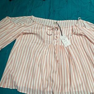 Pink and white stripe, cold shoulder blouse. Bell sleeves.